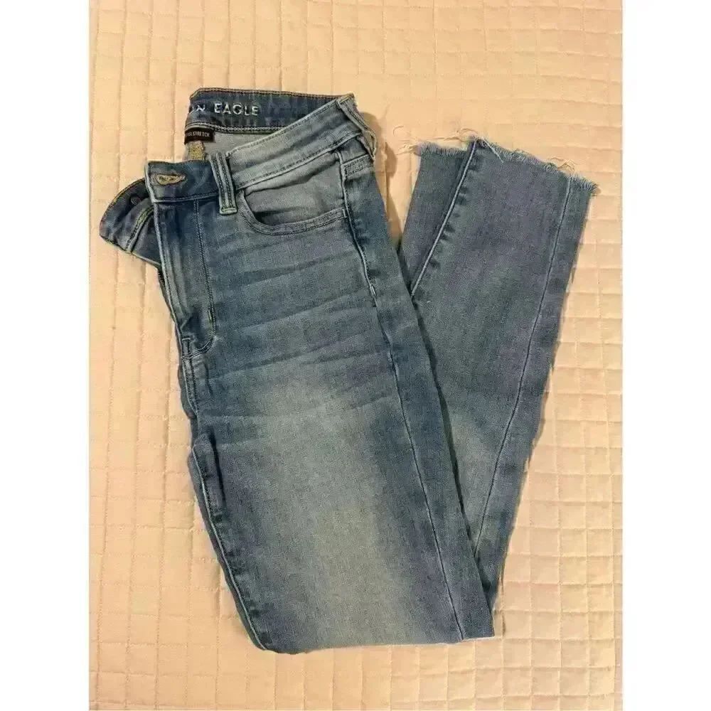 American Eagle Outfitters Light Wash Skinny Jeans with Frayed Hem